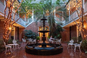 Hotel Provincial in New Orleans, image may contain: Hotel, Resort, Brick, Person