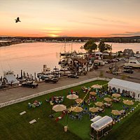 Sunset Landing, waterside Niantic River is an outdoor event venue, featuring both public and private events. Sunset Landing hosts public events when it is not privately rented, and features music, firepits, corn hole and a diverse menu offering lobster rolls, vegetarian options and bbq,complete with full bar, brought to you by Festive Catering.