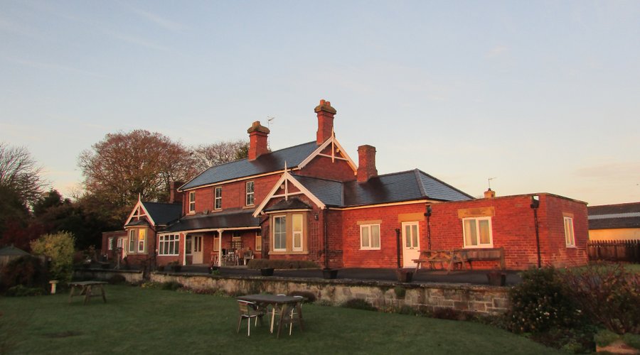 View of Station House in winter light with the old platform a real feature.