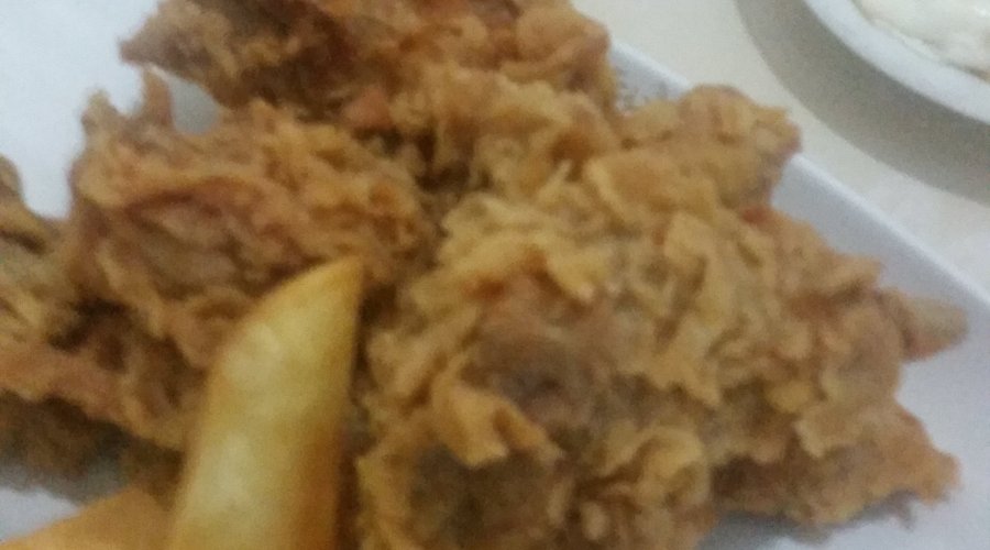 Korean style fried chicken with chunky sweet potato chips. 