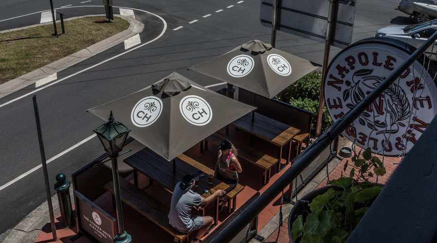 AL fresco dining area below balcony