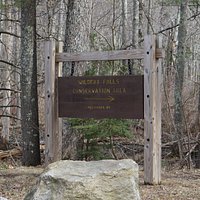 Sign indicating driveway of park