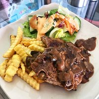 Grill Pork Chop serve with Mushroom Sauce