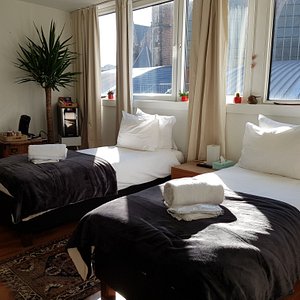 Spacious room with lots of light and the view of the Oude Kerk of Amsterdam. Free Wi Fi, Private bathroom with complimentary toiletteries. The room has a small cooler with complimentary soft drinks.