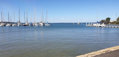 Sitting down by the Jetty at Hastings and enjoying the peace before the seagulls spied our food.