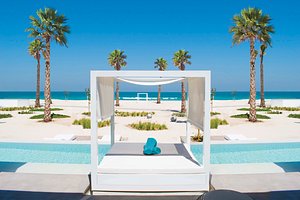 Nikki Beach Resort & Spa Dubai in Dubai, image may contain: Furniture, Bedroom, Indoors, Outdoors