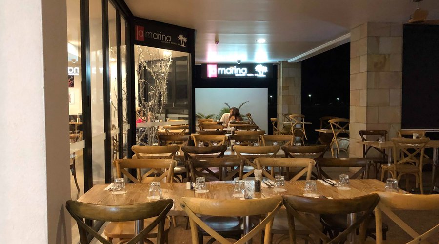 Exterior seating with views of the Boats in the adjoining Marina. Note: Tuesday night was rainy and hence a quiet night.