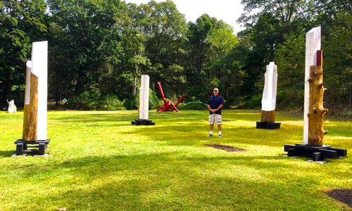 Back of Sculpture Park - Experiments in Wood by Peter Strasser.  In far background - Untitled with Pentagon by Eric Stein