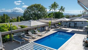 Saltwater Luxury Apartments in Port Douglas, image may contain: Pool, Water, Swimming Pool, Outdoors