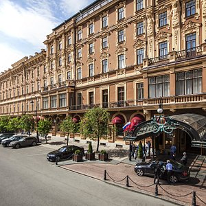 Grand Hotel Europe in St. Petersburg, image may contain: Home Decor, Chair, Table, Couch