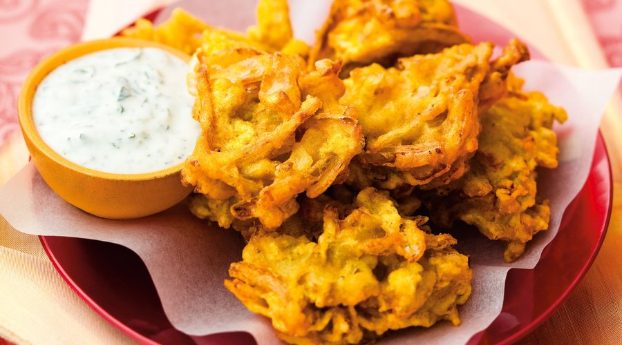 Onion mixed with spices in chicken pea flour batter and deep fried