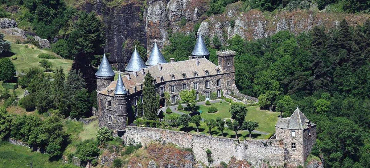 Château du Sailhant in foggy forest