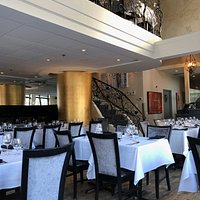 Interior of Coco Pazzo with view to the upper balcony.