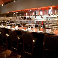 Dine at our Chefs table overlooking the open kitchen concept.