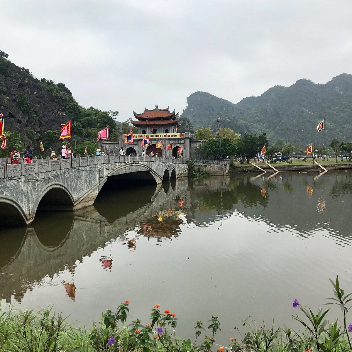 A boat tour through the Ninh Binh countryside is a must-do activity to fully appreciate its natural beauty.