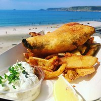 Tofush & battered chips with a homemade vegan tartare sauce & lemon wedge. Pea fritter now also optional.