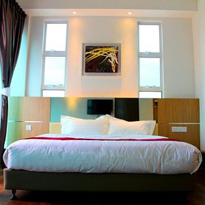 906 Premier Hotel in Melaka, image may contain: Furniture, Interior Design, Bed, Bedroom