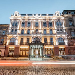 Grand Hotel Lviv Luxury & Spa in Lviv, image may contain: Home Decor, Interior Design, Furniture, Bedroom
