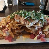 Ahi Tuna Nacho's. Fried Wontons and all the goodies including a delicious sauce and wasabi. A world class appetizer