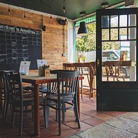 The "Community Table", community notice board and bar seating