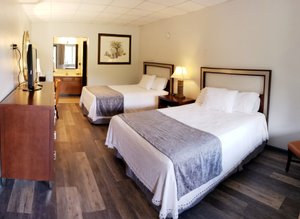 Townsend River Breeze Inn in Townsend, image may contain: Furniture, Dorm Room, Bed, Bedroom