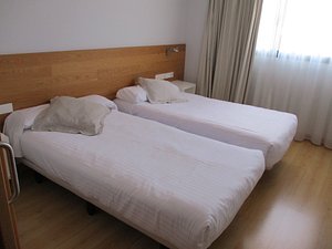Picos De Europa in Santander, image may contain: Furniture, Bed, Bedroom, Room
