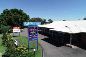 Sleepy Hill Motor Inn in Raymond Terrace, image may contain: Hotel, Building, Motel, Gas Pump