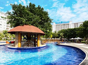 Jpark Island Resort & Waterpark in Mactan Island, image may contain: Hotel, Resort, Pool, Person