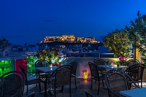 Attalos Hotel in Athens, image may contain: Chair, Resort, Terrace, Scenery