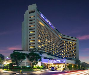 Dusit Thani Manila in Luzon, image may contain: Hotel, Office Building, City, Convention Center