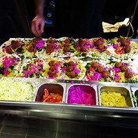 The best falafel in town. Small falafel wraps being prepared fresh to order at lunchtime.
