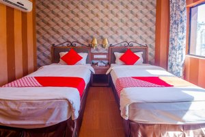 K Garden Hotel in Sungai Petani, image may contain: Bed, Furniture, Hostel, Housing