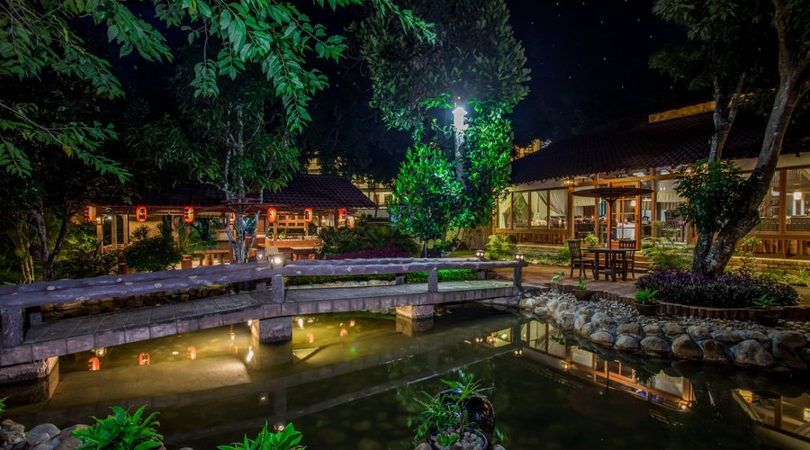 Night view of Japanese style Garden with Bridge and Pound. It was built like the small vision of Kyoto, Japan.
