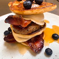 Pancake Stack - Scotch Pancakes, Pork Sausage Patty, Fried Eggs, Smoked Streaky Bacon, Maple Syrup & Fresh Blueberries