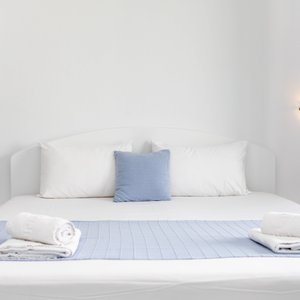 Superior Double Studio: 1 double bed, air-conditioning, kitchenette, refrigerator, hair-dryer, TV, dining area, bathroom with shower, Wi-Fi connection and balcony (back view) on 2nd floor. 
