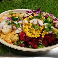 Our delicious Cilantro Lime Shrimp bowl with Mexican corn esquites, beat onion salsa, guacamole, and sprinkled with cilantro, onions, and jalapeno on a salad bowl with Spanish rice. This bowl is as healthy as it is colorful. Come try it out.