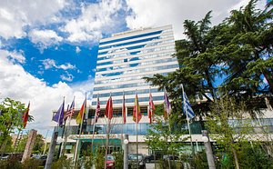 Tirana International Hotel & Conference Centre in Tirana, image may contain: City, Office Building, Hotel, Urban