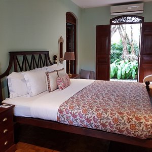One of the bedroom suites with its private garden in the background.