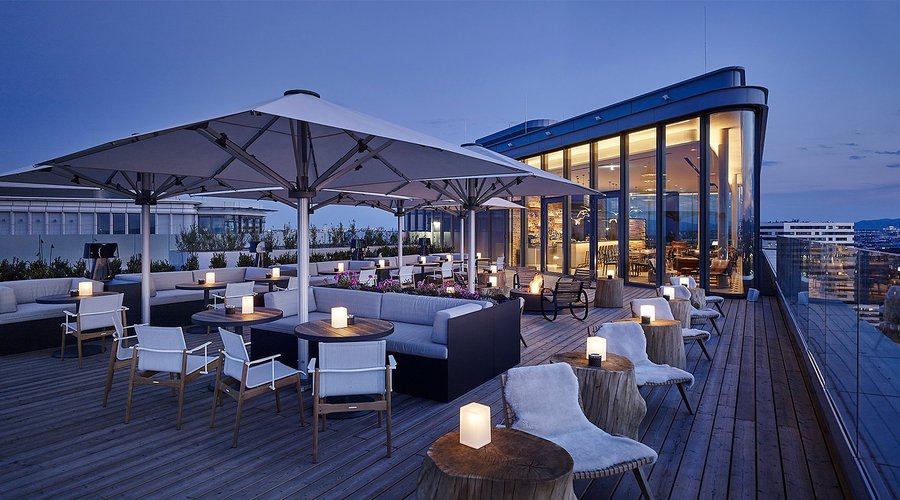 Amazing rooftop terrace with open fireplace for mild summer nights. 