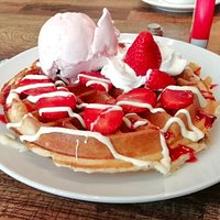 Strawberries and white chocolate waffle.