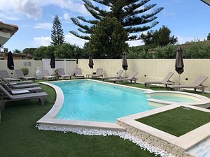 Suimi's Hotel in Sardinia, image may contain: Backyard, Pool, Swimming Pool, Villa