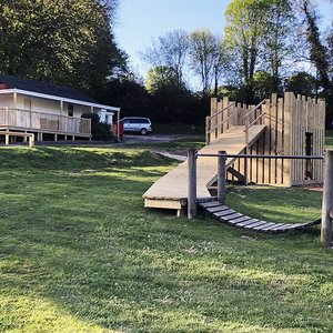 Children's Play Area with Coffee Shop in the Background