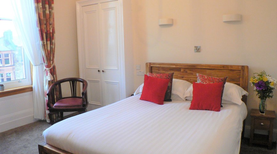 One of our double en suite rooms. All have the lovely Victorian high ceilings and are recently refurbished