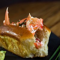 Original Lobster roll ... with warm butter toasted bread and our secret spices !