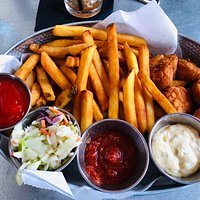 The fries are great, but the star of this dish is the fried scallops.