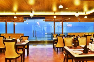 Citrus Classic Hotel Mcleodganj in McLeod Ganj, image may contain: Restaurant, Dining Table, Cafeteria, Cafe