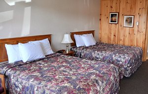 Bay Vista Motel in Cavendish, image may contain: Furniture, Bed, Hotel, Interior Design