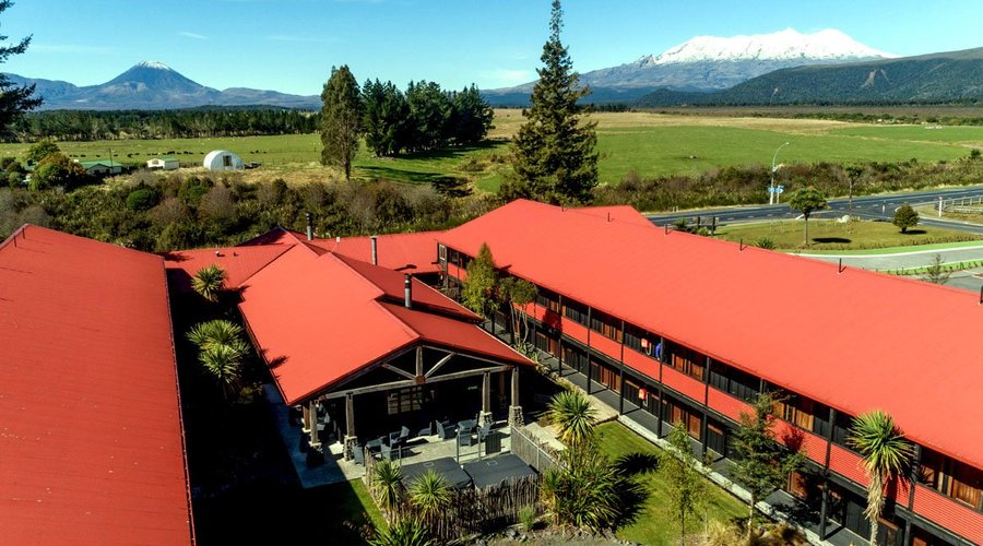 View across courtyard to Mts Ngaruhoe and Ruapehu.