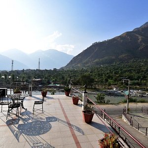 Mashoo Resorts in Bhuntar, image may contain: Scenery, Plant, Terrace, Waterfront