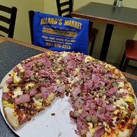 Allard's Market and Deli in North Berwick Maine is a great place to stop and fuel up on those items that make a trip extraordinary. Breakfast Pizza from here is one of those items. A place where you can get all your road trip needs.